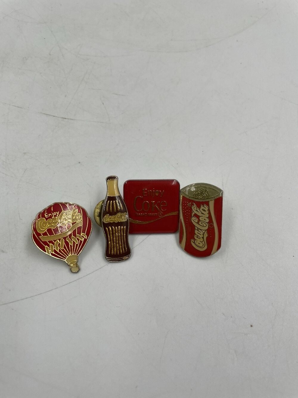 Lot of 4 Vintage Coca-Cola Enamel Advertising Pins